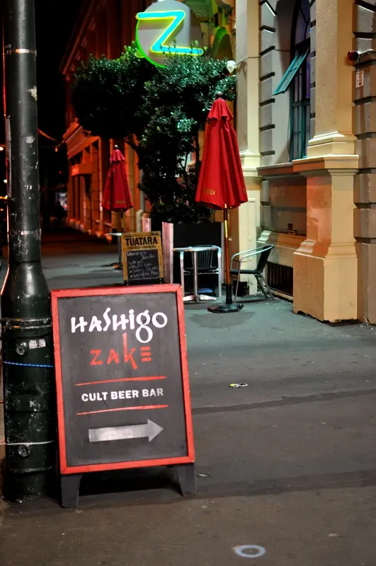 A street sign for Hashigo Zake cult beer bar
