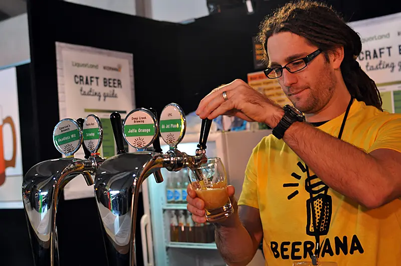 Pouring beers at the Beervana bar