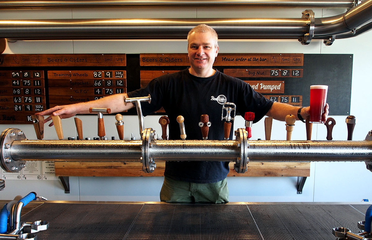 Richard Watkins with a full font of taps and a new beer.