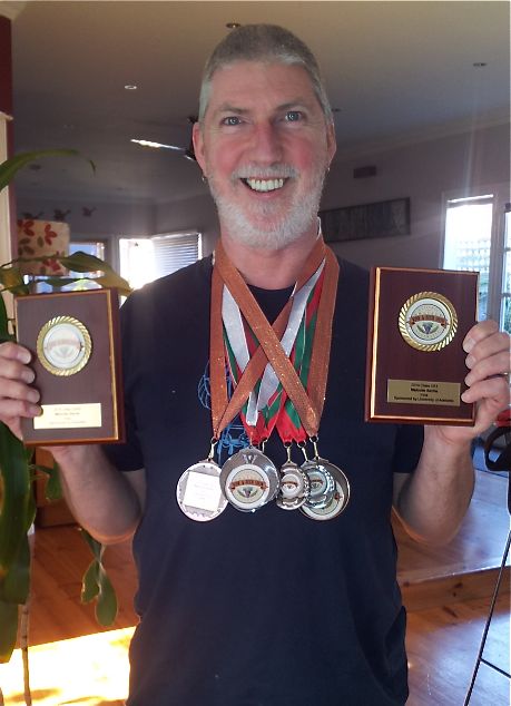 Cubby Haus founder Malcolm Sachs with amateur brewing gongs