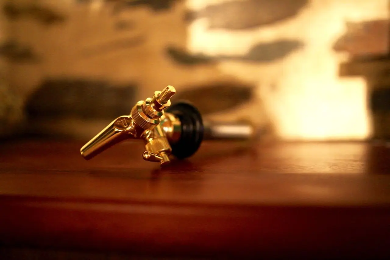 One of Nola's gold-plated Perlick taps