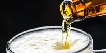 A glass of cold beer macro photography