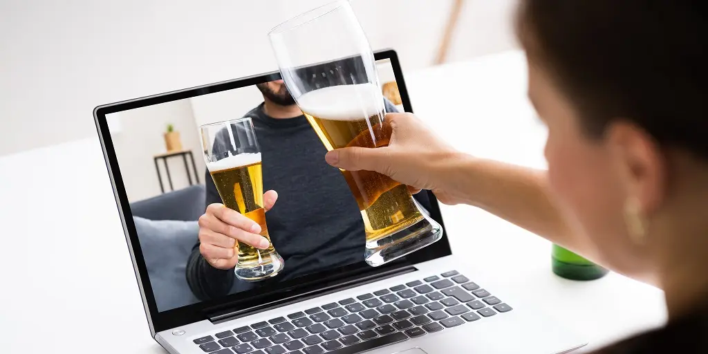 COVID-19 pandemic drinking beer virtual meeting Zoom drinks