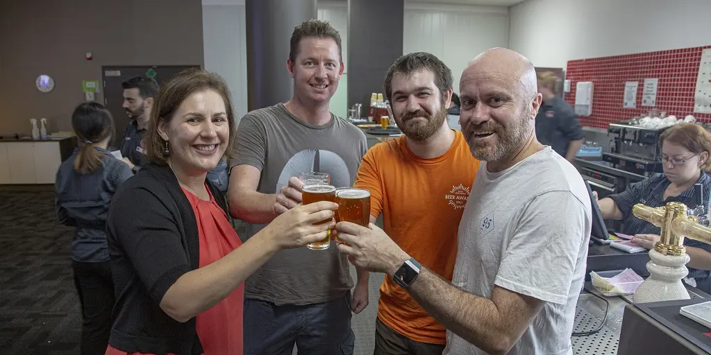 Teacher Kate Stuart, students Brian Dack, Matthew Wolfe and teacher Steve Henderson