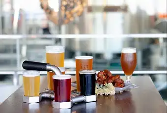 Beers and food on a table
