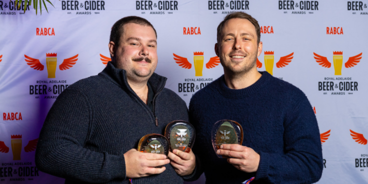Two men from Barossa Valley holding their awards at the Royal Adelaide Beer & Cider Awards in 2023.