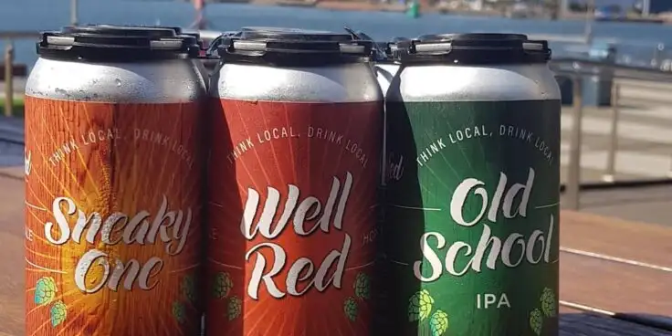 Three cans of Grainfed Brewing's beers