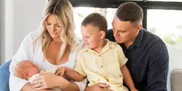 Bueta family looking at Toby