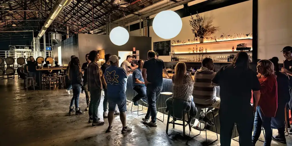 People at the Valhalla Brewing bar