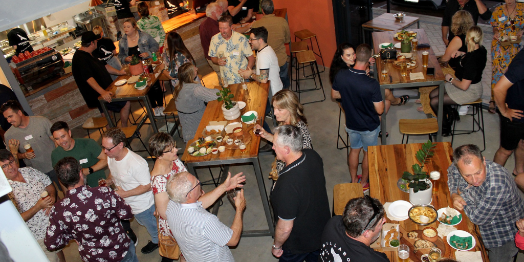 High angle shot of patrons at Wedgetail Brewing