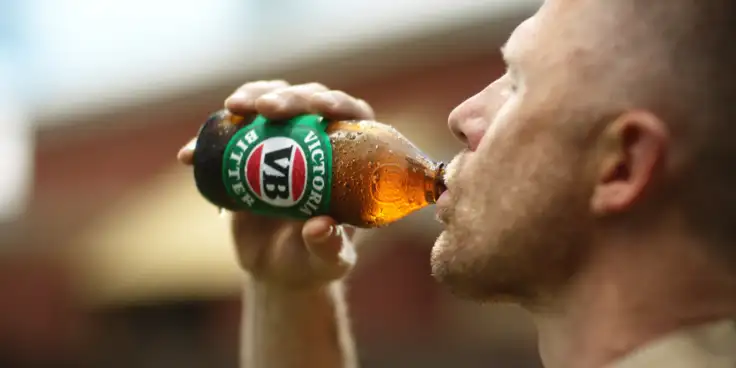 New Victoria Bitter ad with man drinking VB beer