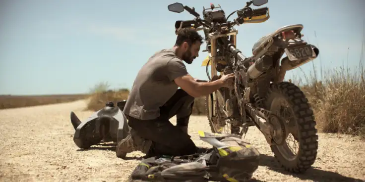 New Victoria Bitter ad with man fixing motorbike